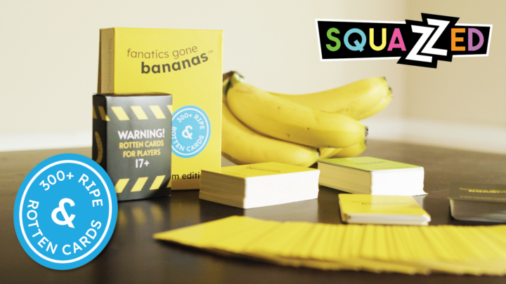 A medium-shot photo of Fanatics Gone Bananas, including the rotten box, decks of cards, cards fanned out, and a bunch of bananas on a table. Features the colorful Squazzed logo and the "300+ Ripe & Rotten Cards" sticker.
