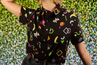 A Hawaiian shirt filled with totally ace shapes, against a static background.