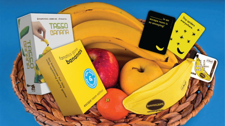 A fruit bowl holds edible and non edible contents.