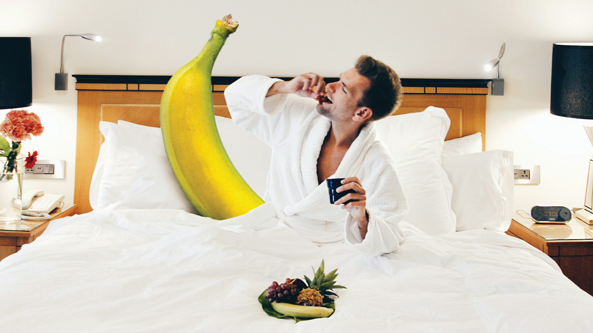 A banana shares a bed with an enthusiastic male.