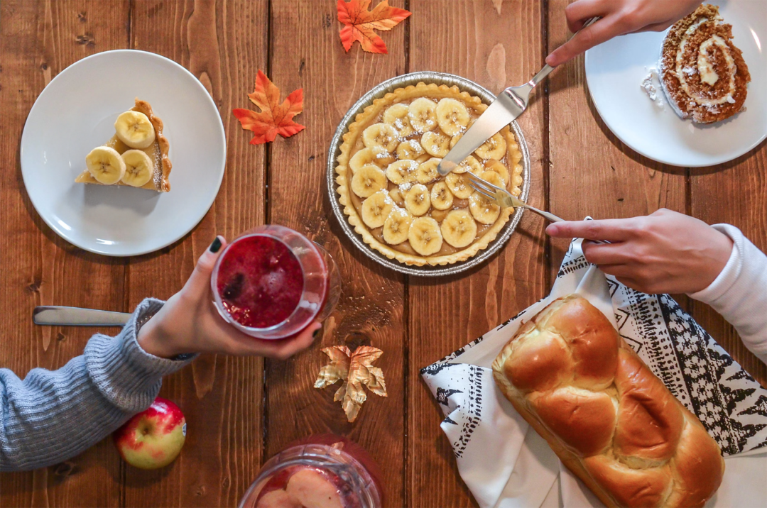 A Piece Of The Pie A banana pie being cut and plated up.